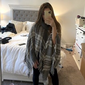 Grey and white poncho
